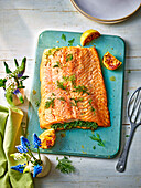 Stuffed salmon side with creamy spinach