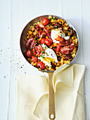 Corn pasta with egg, roasted corn, crispy bacon and cherry tomatoes