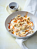 Turkish manti filled with spiced minced lamb