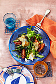 Sicilian stockfish salad with tomatoes and beans