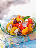 Pepper salad with anchovies and olives