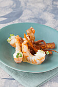 Prawns with fried vegetable chips