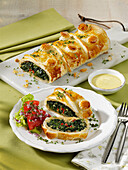 Vegetarian vegetable roulade with spinach and ricotta cheese