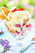 Crunchy Peanut Ice Cream Sundae with Strawberries and Bananas