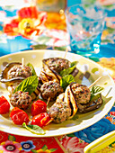 Lamb skewers with eggplant and tomatoes