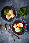 Beetroot soup with potatoes and egg