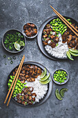 Bowl with rice, tofu, mushrooms and edamame