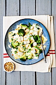 Spinach ravioli with broccoli, gorgonzola and pine nuts