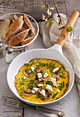 Frittata with spring onion, mushrooms and feta cheese