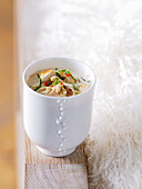 Thai chicken soup in a cup