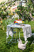 Festive cake with fruit on a garden table