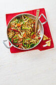 Fried noodles with crunchy vegetables, sesame seeds, egg, and soy seasoning