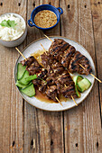 Asian sate skewers of marinated rump steaks with ginger and chili