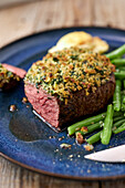 Fillet of beef with herb crust and green beans