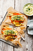 Salmon parcels with white asparagus and carrots