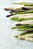 White, green and purple asparagus spears