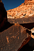 Anthropomorphic figures chiselled on a boulder, Utah, USA