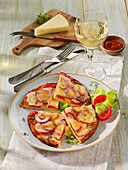 Cauliflower pizza with provolone cheese and tomatoes (flourless)