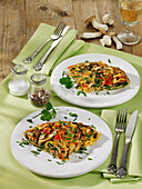 Mushroom omelette with spinach and tomato