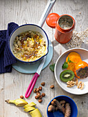 Ingredients for porridge with fruits, nuts and turmeric