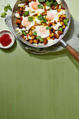 Spiced potatoes with eggs and feta