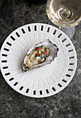Oyster with lime, ginger, chilli and coriander