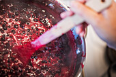 Boiling black currant jelly