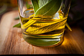 Fresh sage leaves in olive oil
