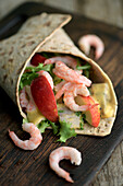 Wrap with herring, shrimp, apple, and curry sauce