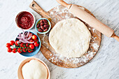 Pizza dough with ingredients