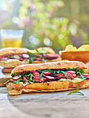 Thyme, garlic and soy bavette ciabatta with slabs with rocket and wasabi mayo