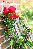 Wreath made of holly and rose hips