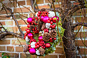 Wreath with Christmas balls hanging from branches