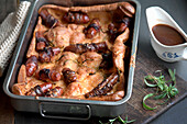 Toad in the hole (sausages baked in batter, England)