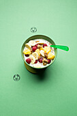 Pineapple crunch with bananas and raspberries