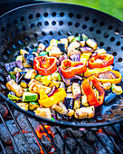 Colorful summer vegetables in grilling pan