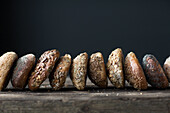 Many different grain rolls on a black background