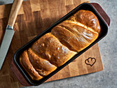 Yeast plait in a loaf tin