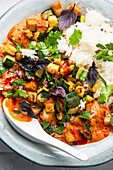 Red tofu courgette curry