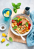Paprika risotto with chicken and oven tomatoes