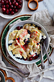Pierogi (Polish dumplings) with blueberries and cherries