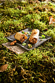 Umami forest mushroom roll with herb mayo and caramelized walnuts