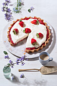 Curd tart with white chocolate cream and strawberries