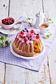 Bundt cake with cream and berries