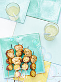 Grilled potato and chicken skewers