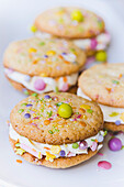 Cookie sandwiches with colorful sugar confetti