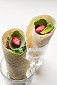 Wraps with dried strawberries and basil
