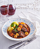 Rich beef stew with potato-celery puree