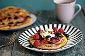 American pancakes with berriesAnd cardamom