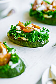Fried zucchini with kale, soft cheese and cherry tomatoes